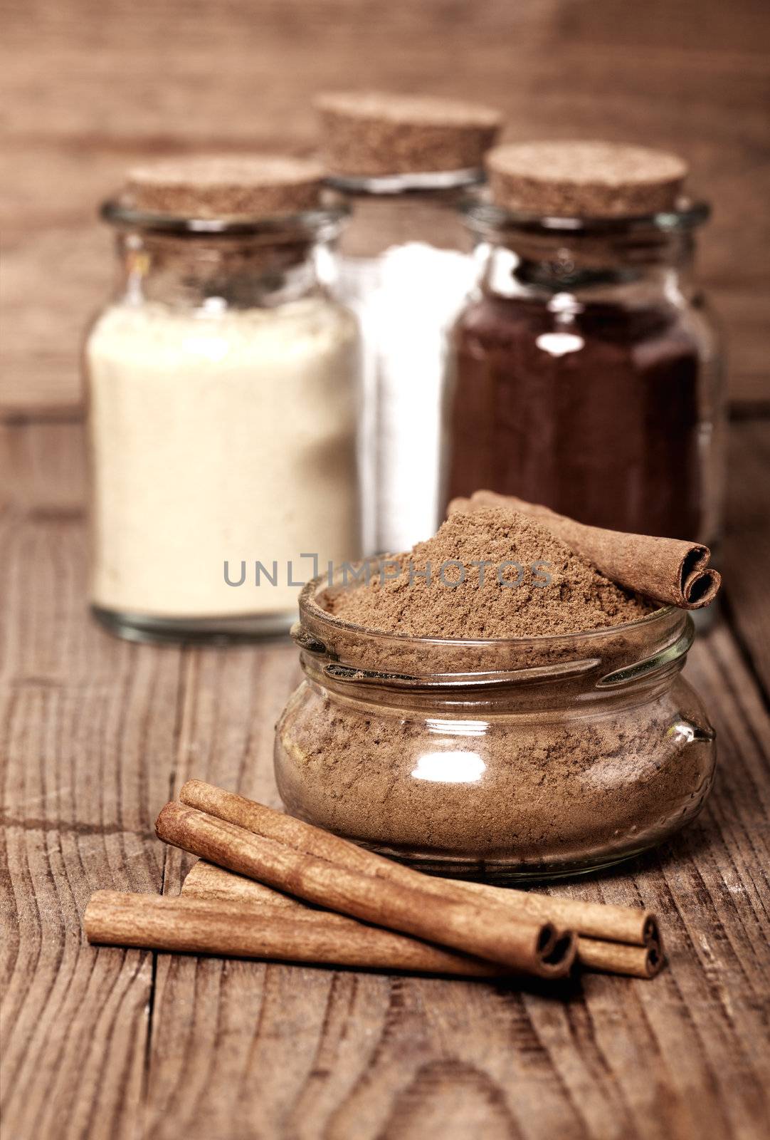 cinnamon, or chinese cinnamon in the transparent glass jar with  by motorolka