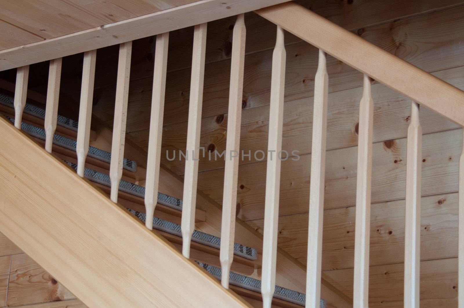 Detail of wooden stairs with wooden ceilings and walls