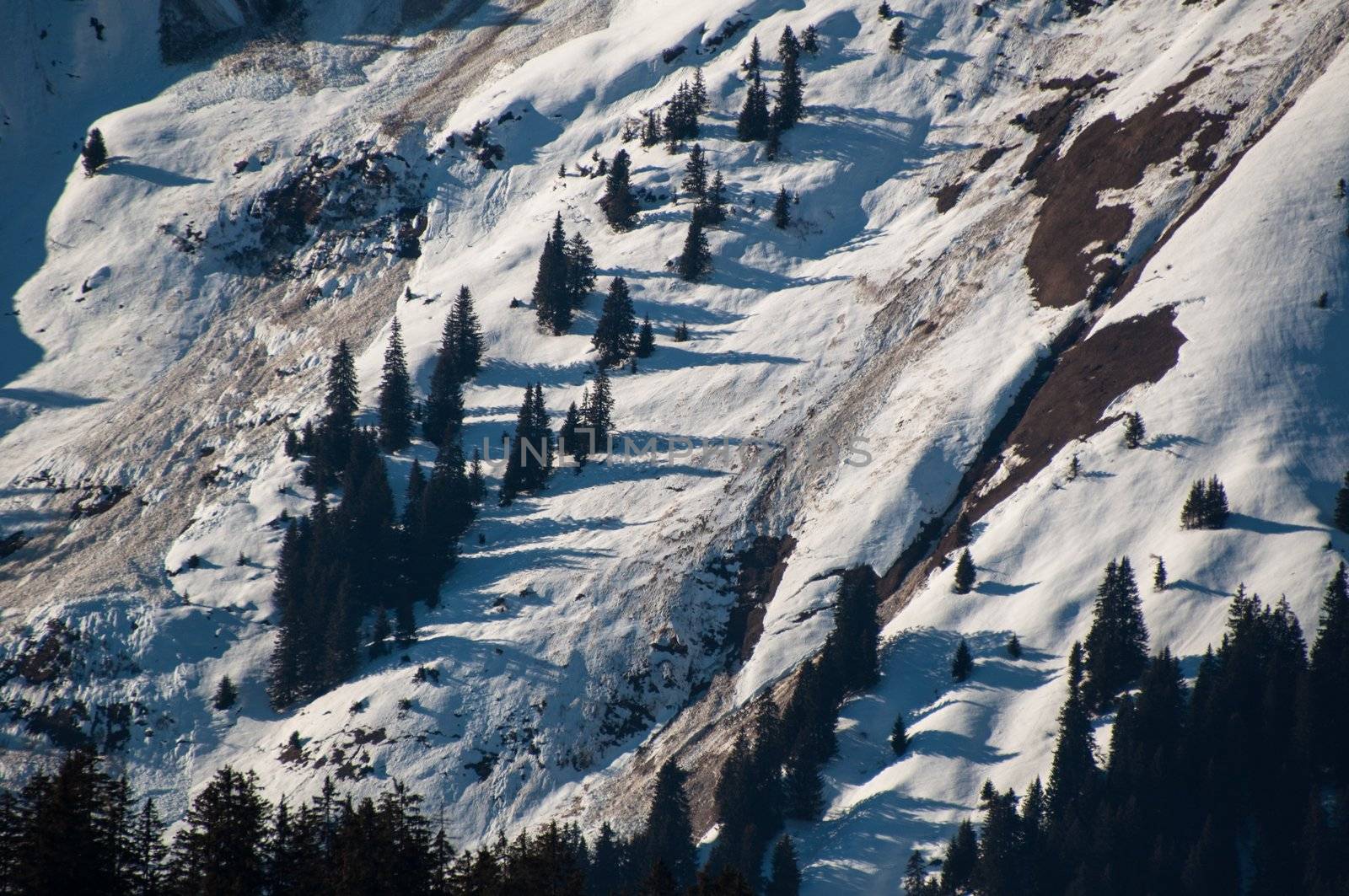 Landslide and avalanches in skiing mountains in early spring in Montafon, Austria