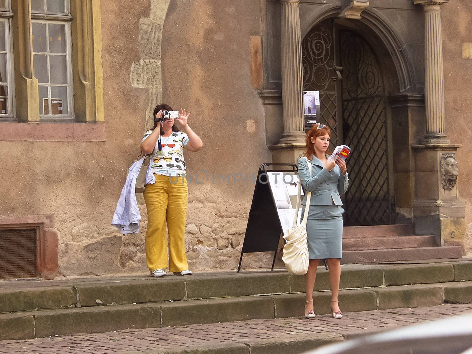 09/14/2007. Colmar. France. Two young women looking at the sights of the city