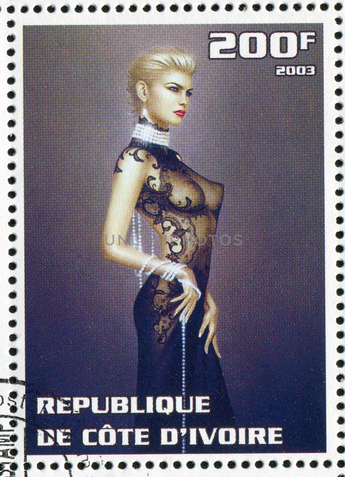 IVORY COAST CIRCA 2003: stamp printed by Ivory Coast, shows sexy woman, circa 2003