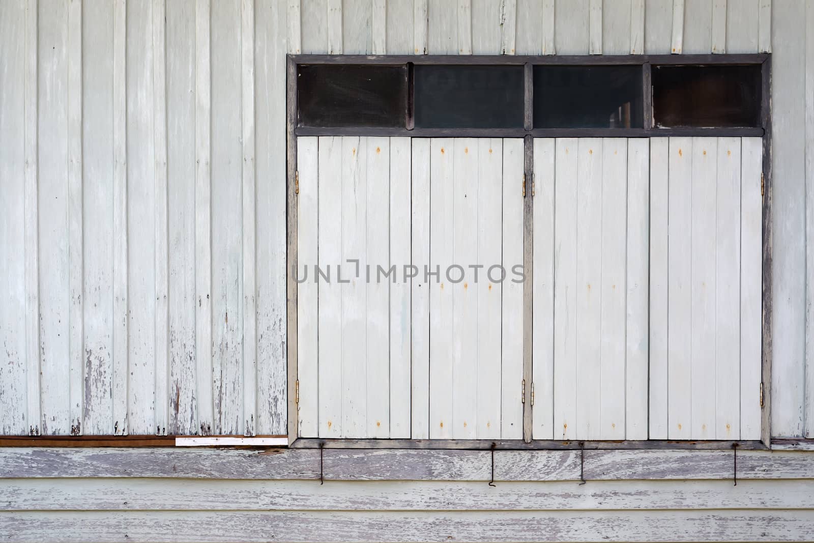 Close Old white wood window by nuttakit