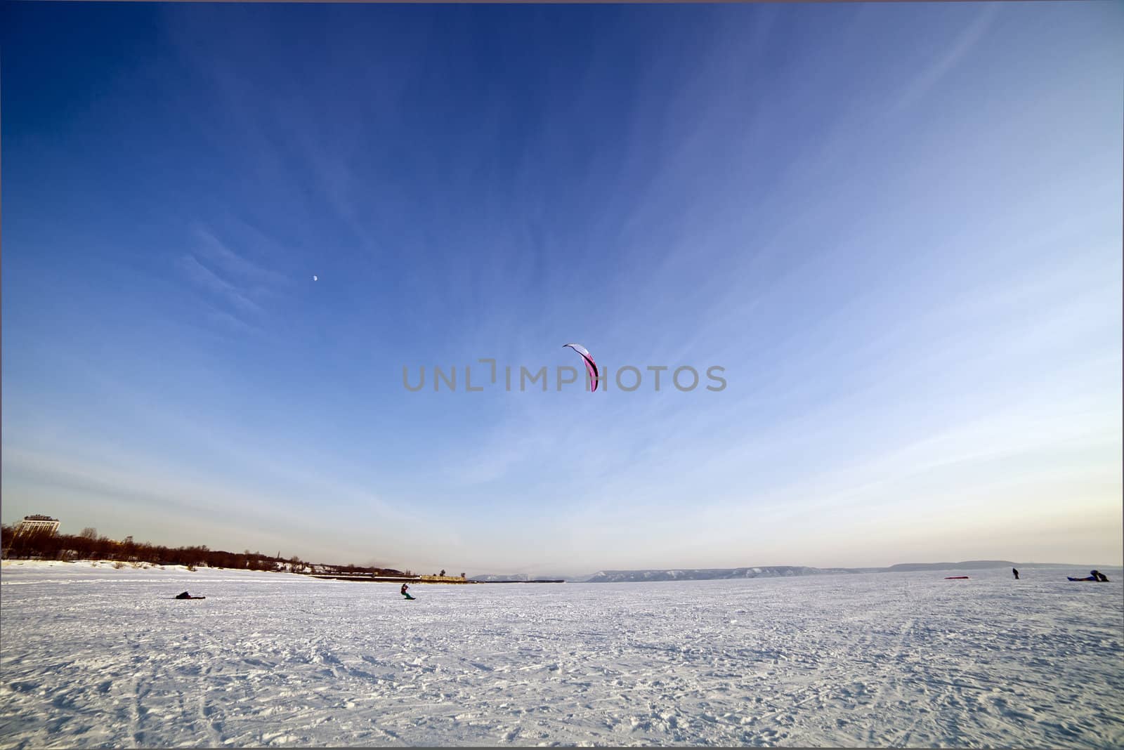 the Ski kiting on a frozen lake