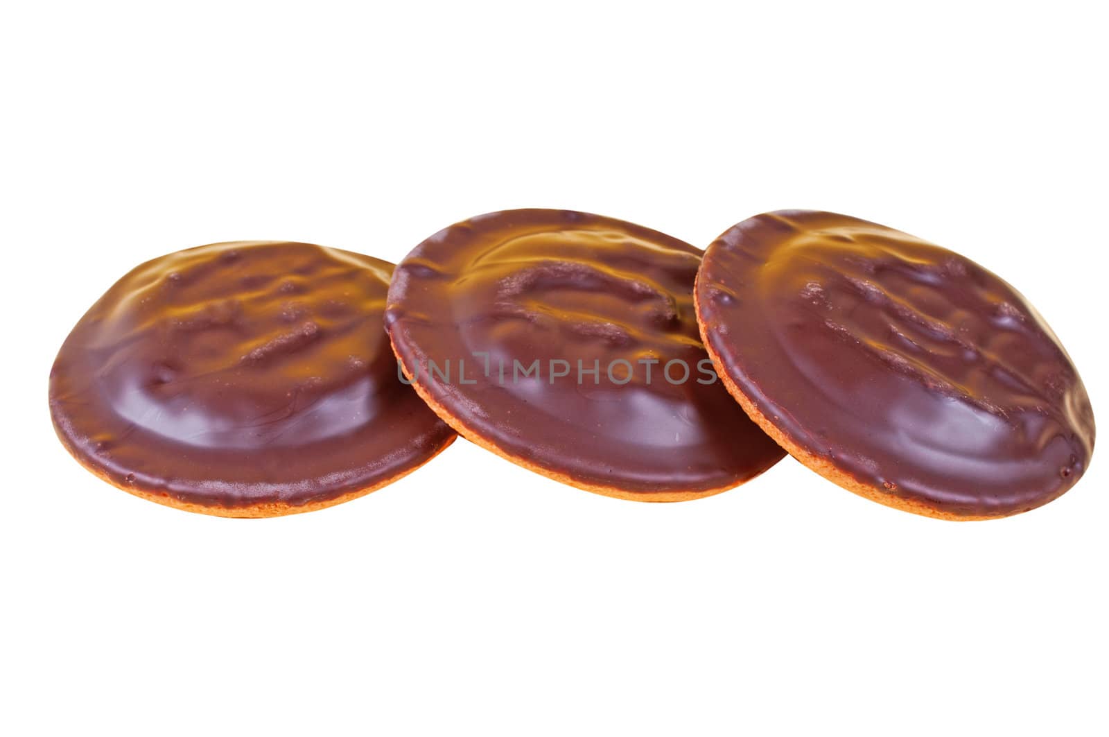 Three chocolate cookies isolated background close up