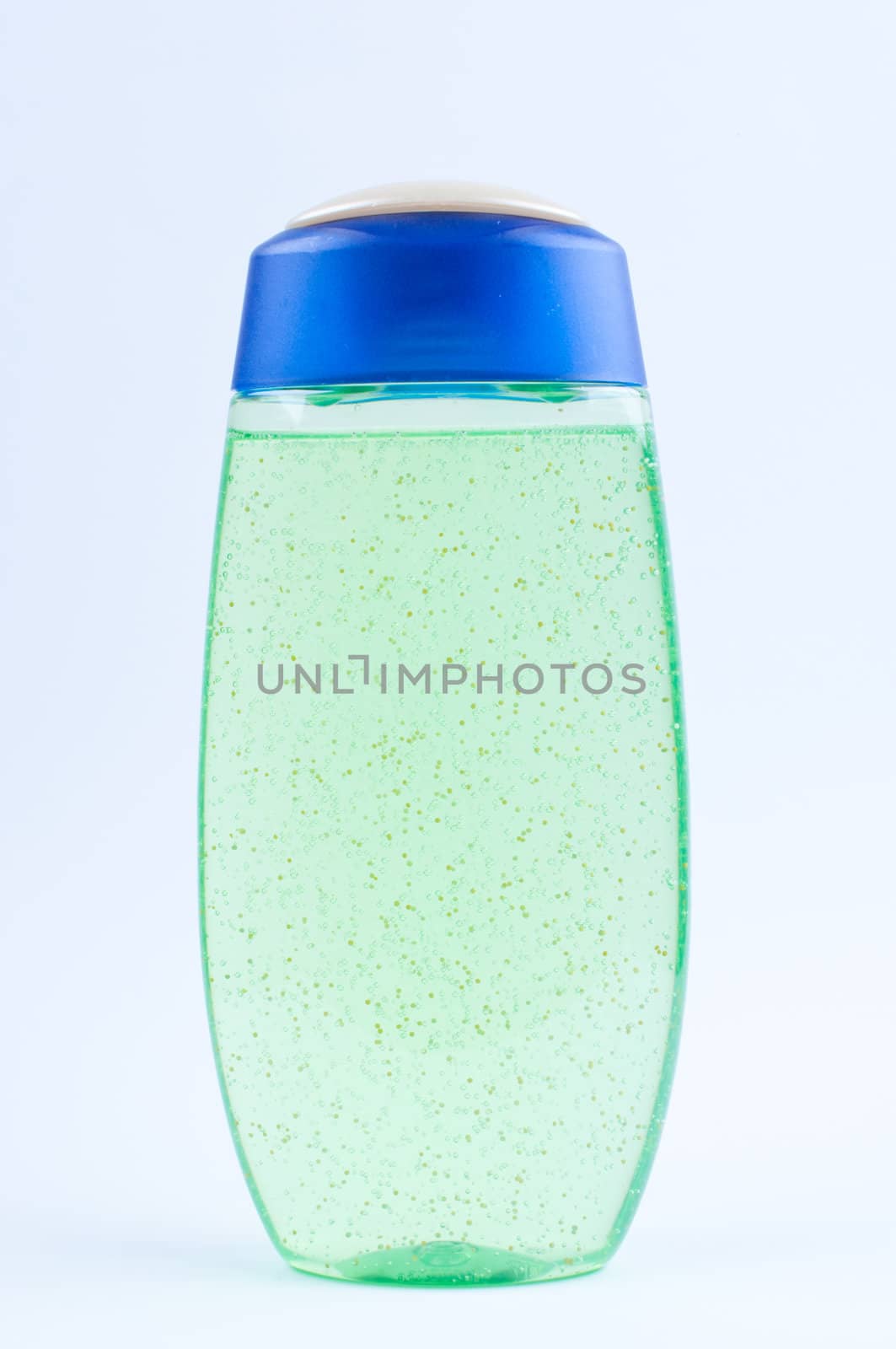 Green shower gel  in bottle on white background