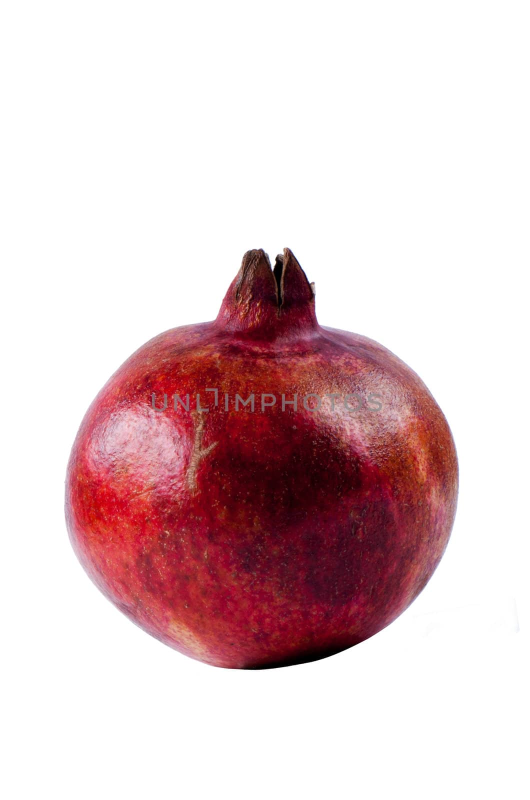 Pomegranate isolated on white background close up