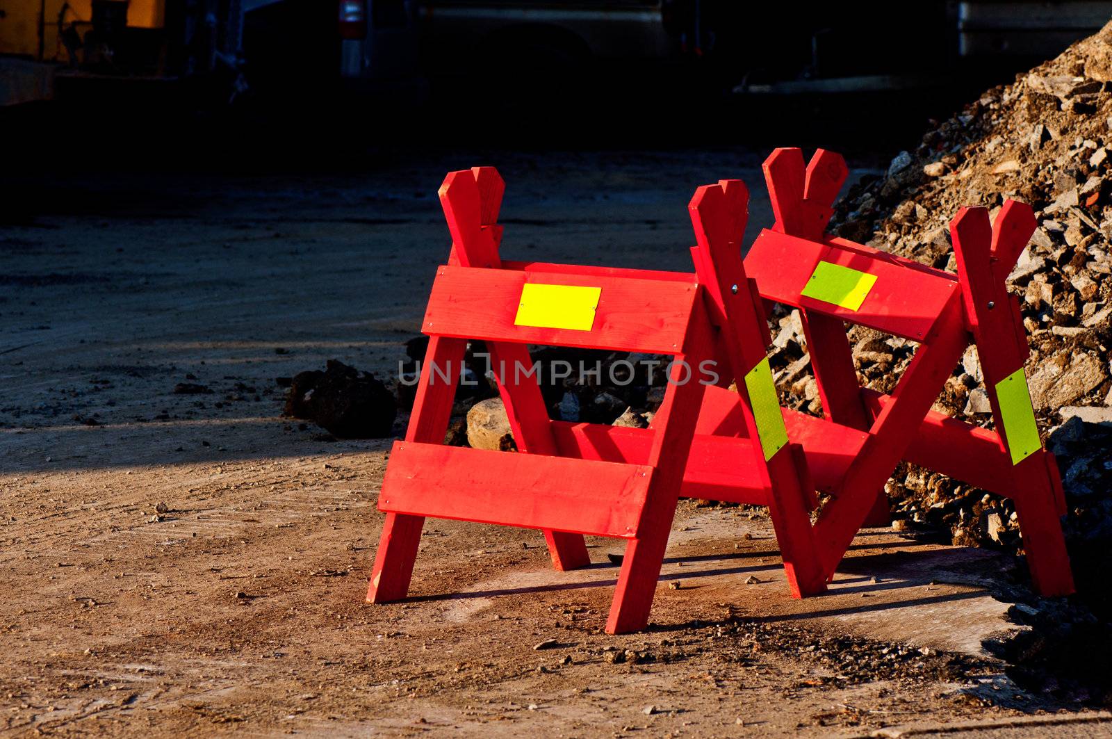 Couple road construction barrier with yellow sticker