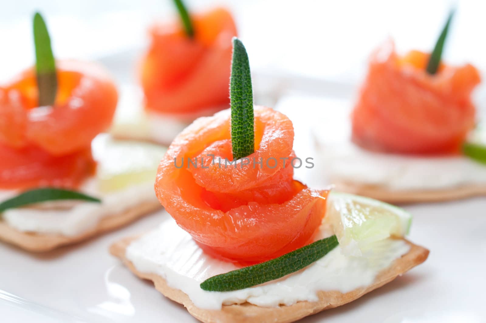 Canapes with smoked salmon and cream cheese close up