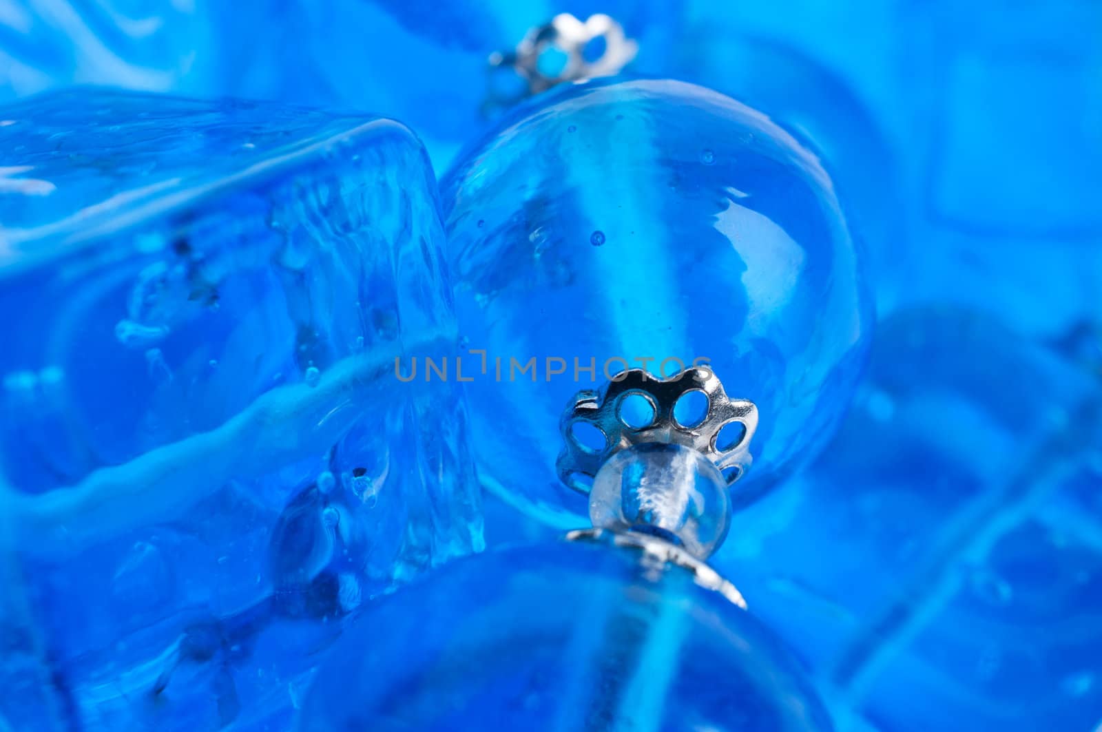 Blue glass beads background close up