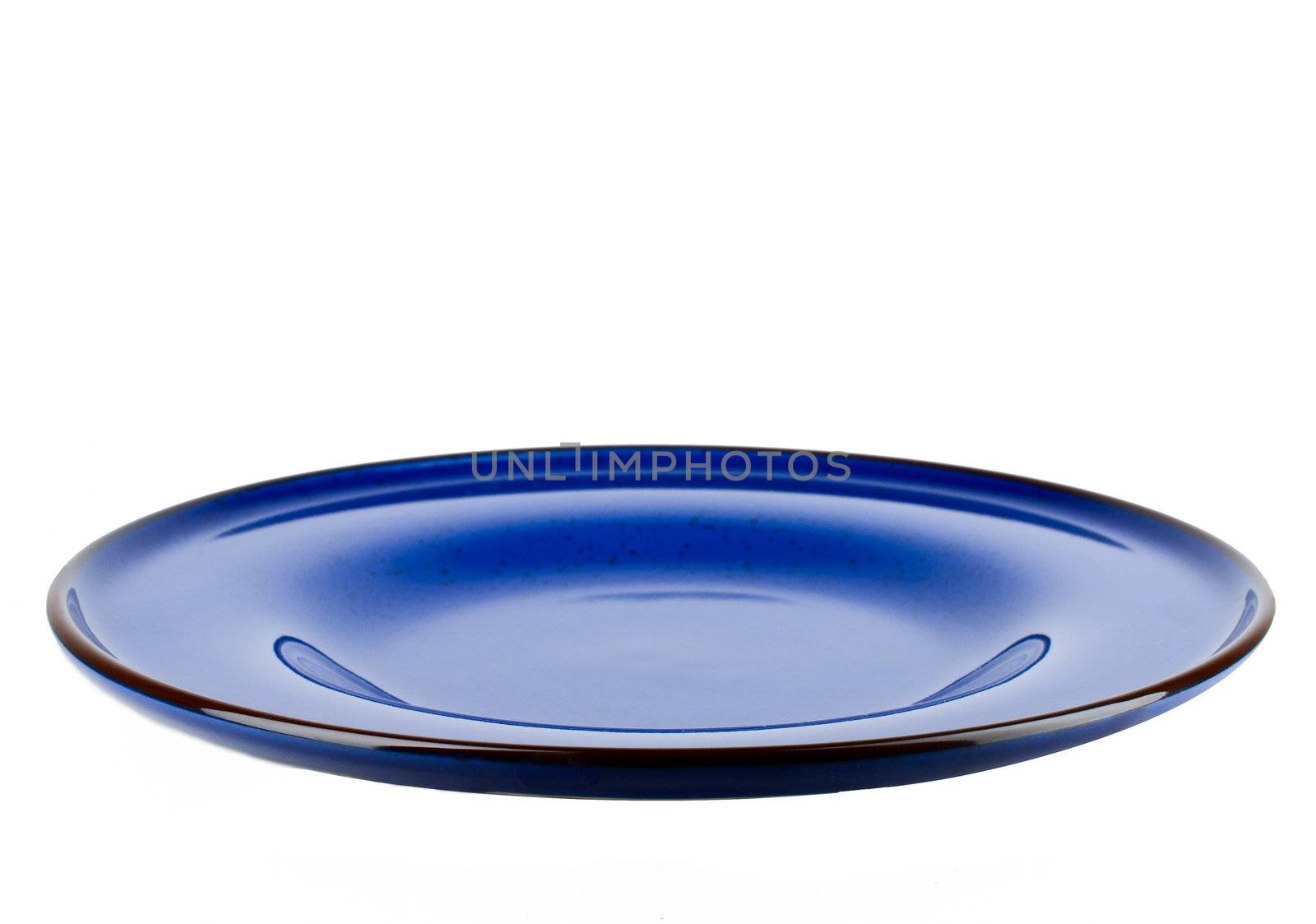Dark blue plate isolated