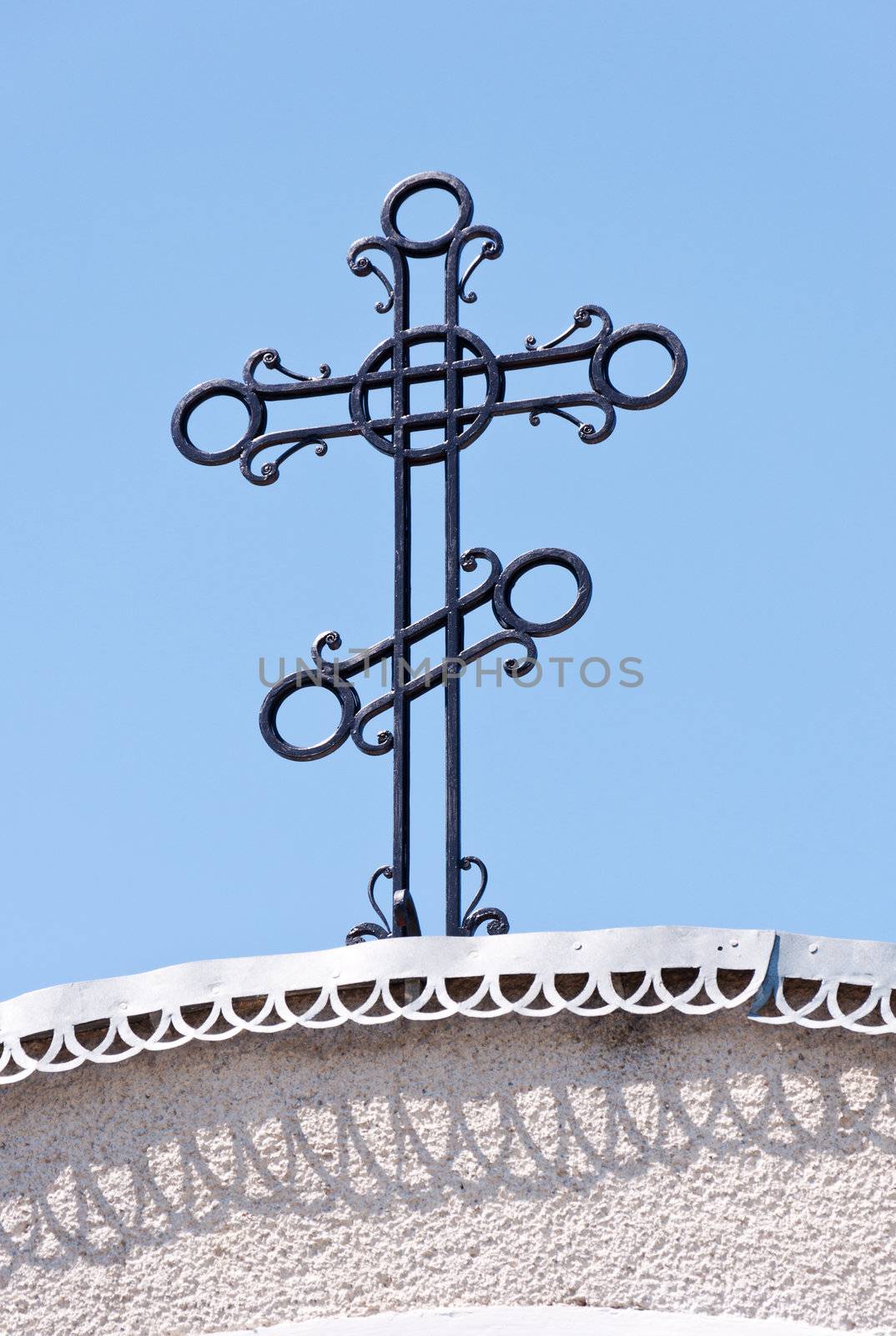 Orthodox cross on arch