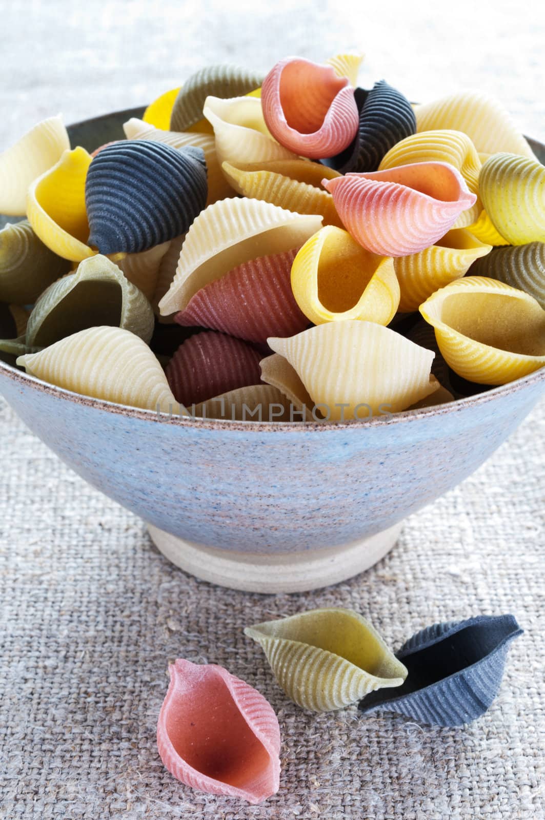 Multi colored pasta in bowl