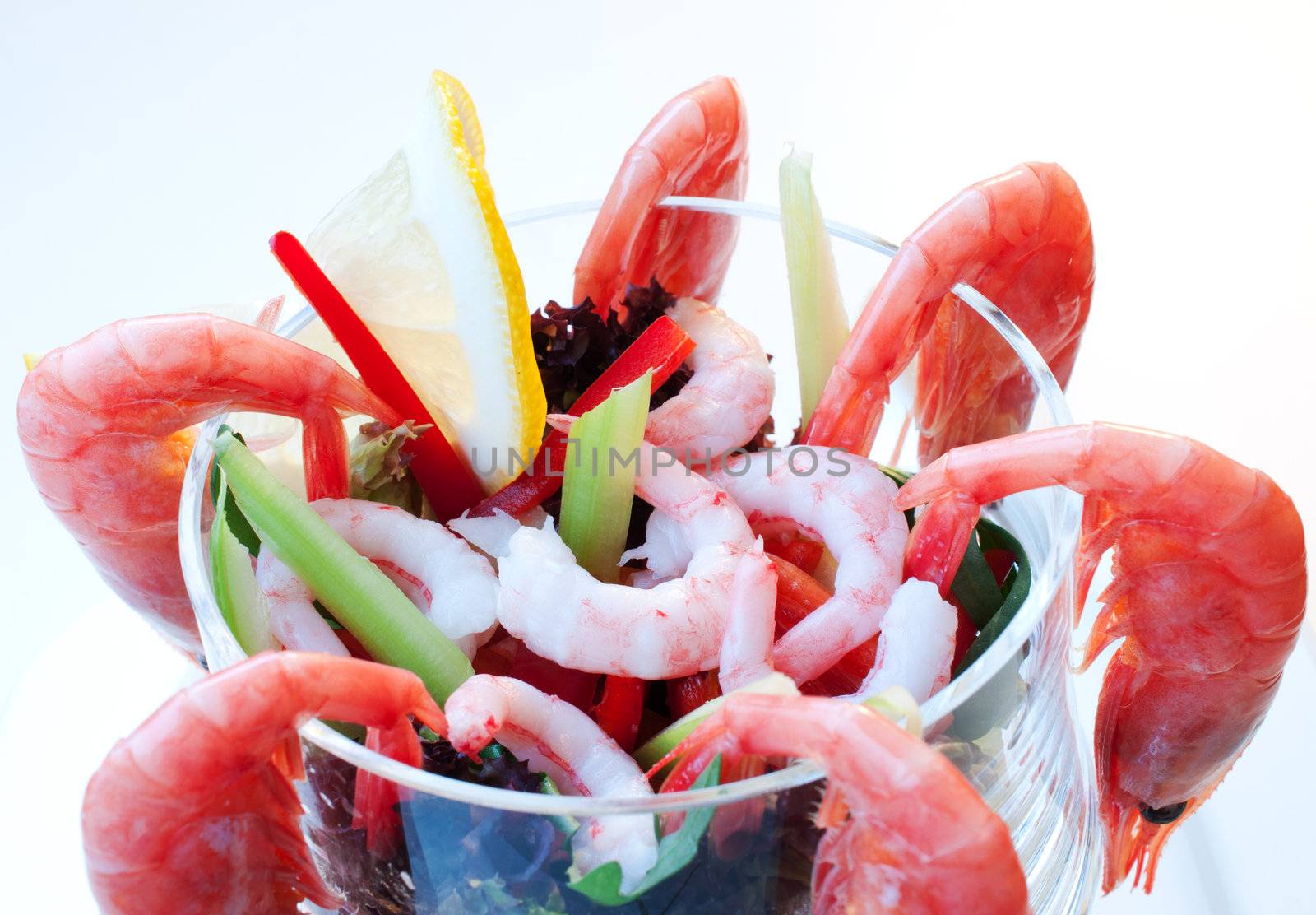 Shrimp cocktail in a salad bowl close up