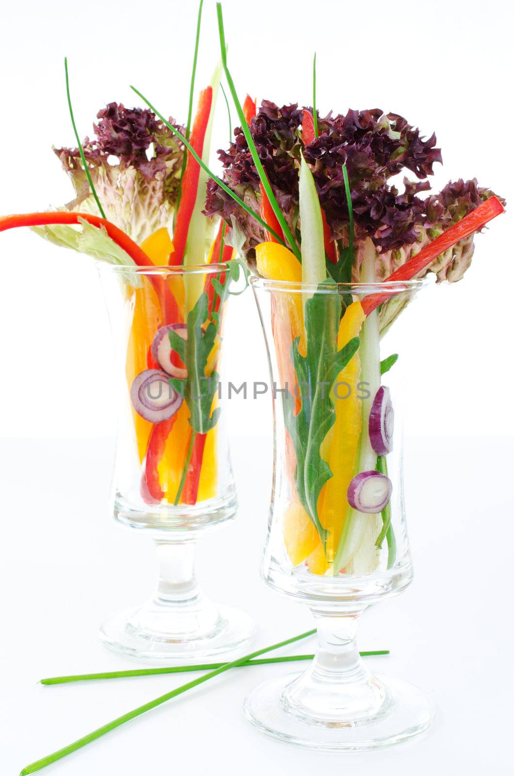 Two glasses with vegetables by Nanisimova