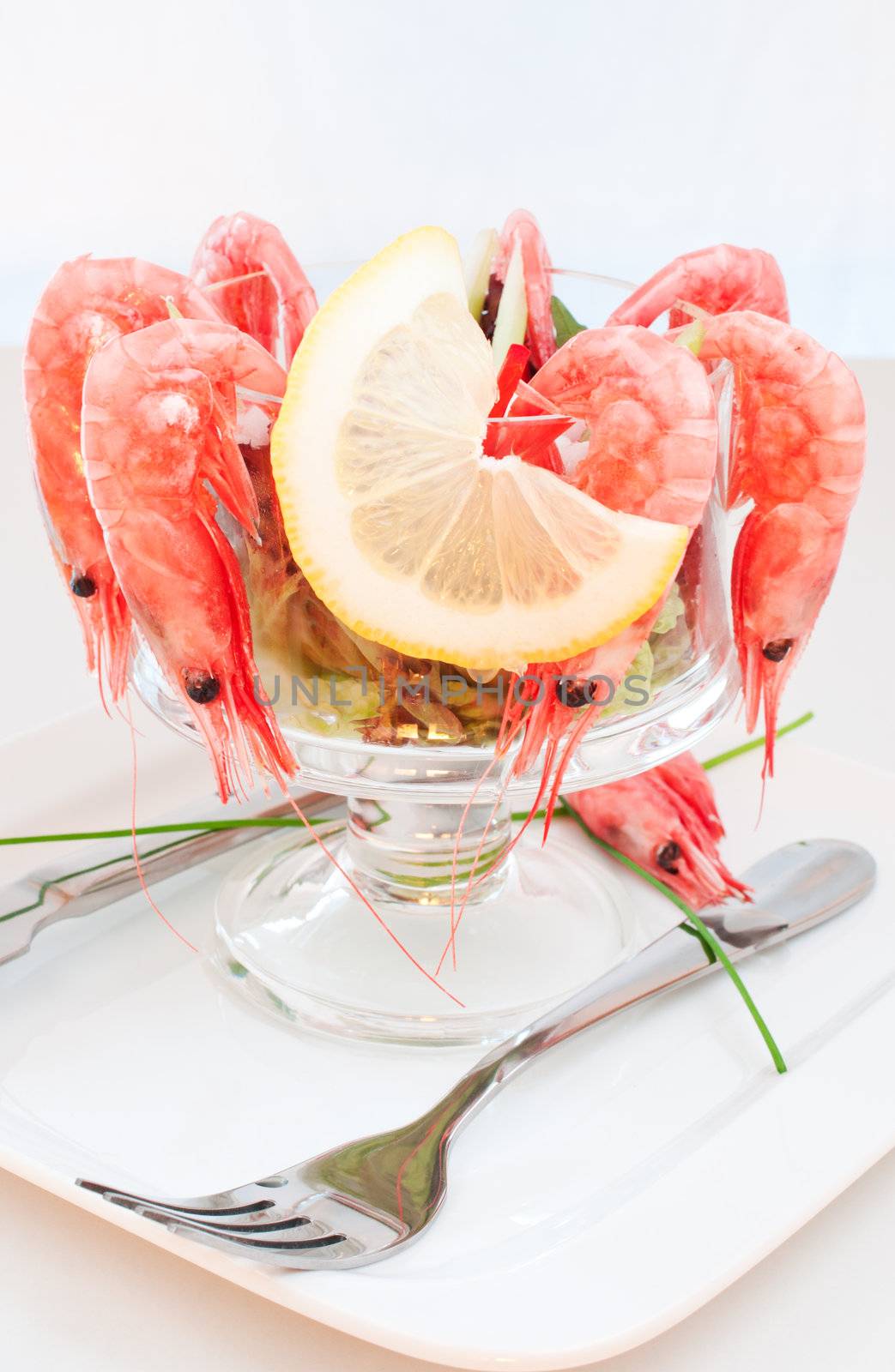 Shrimp cocktail with lemon by Nanisimova