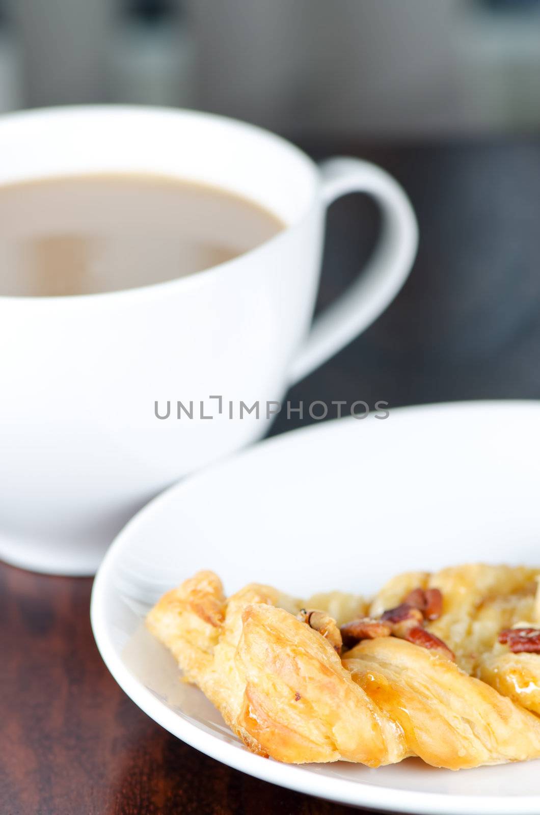 Сup of coffee with  bun by Nanisimova