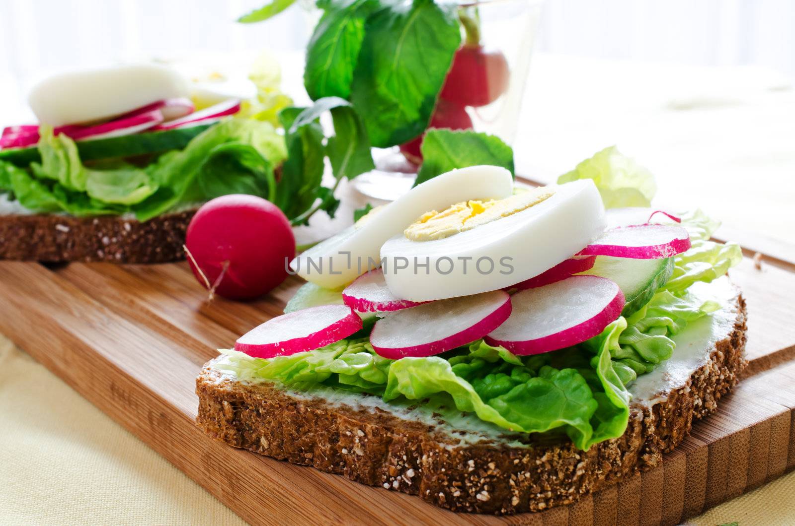 Fresh toast sandwiches with egg,radish,cucumber and soft cheese