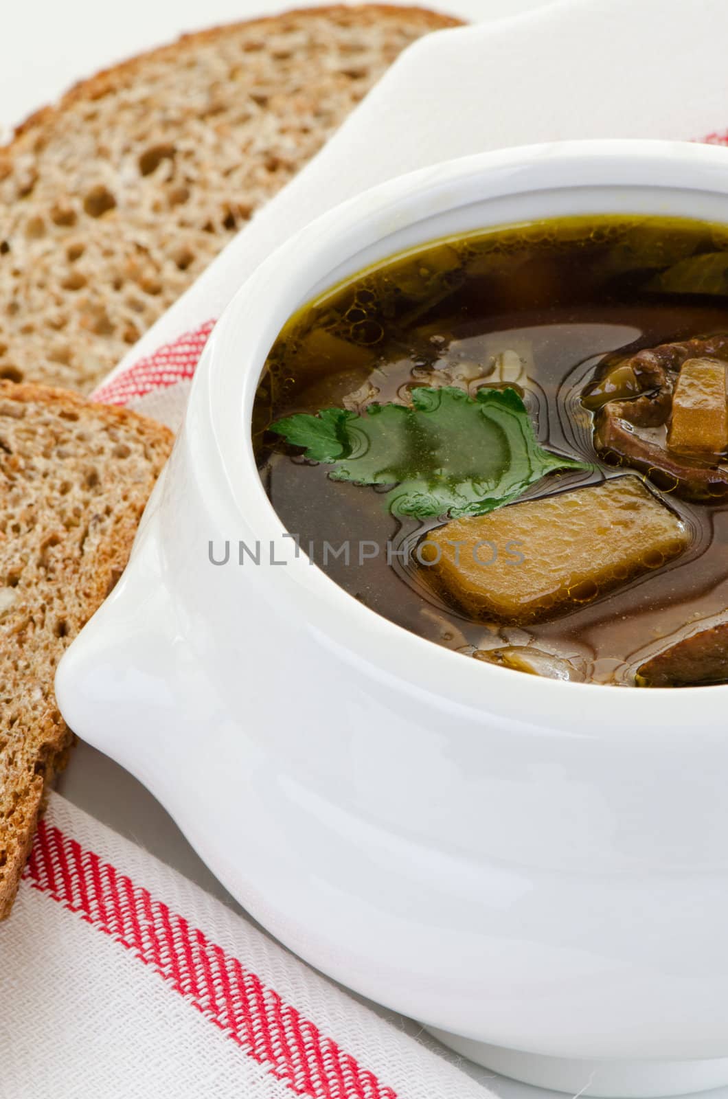 Bowl of mushroom soup close by Nanisimova