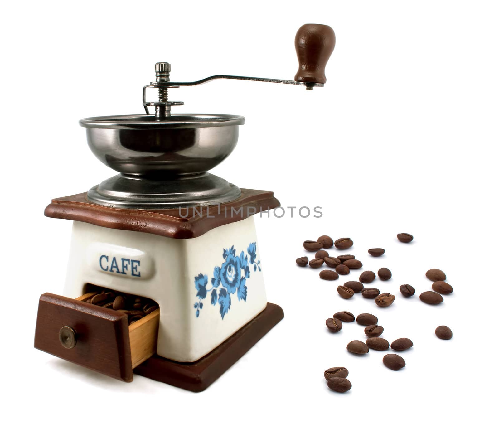 Vintage coffee mill with coffee beans