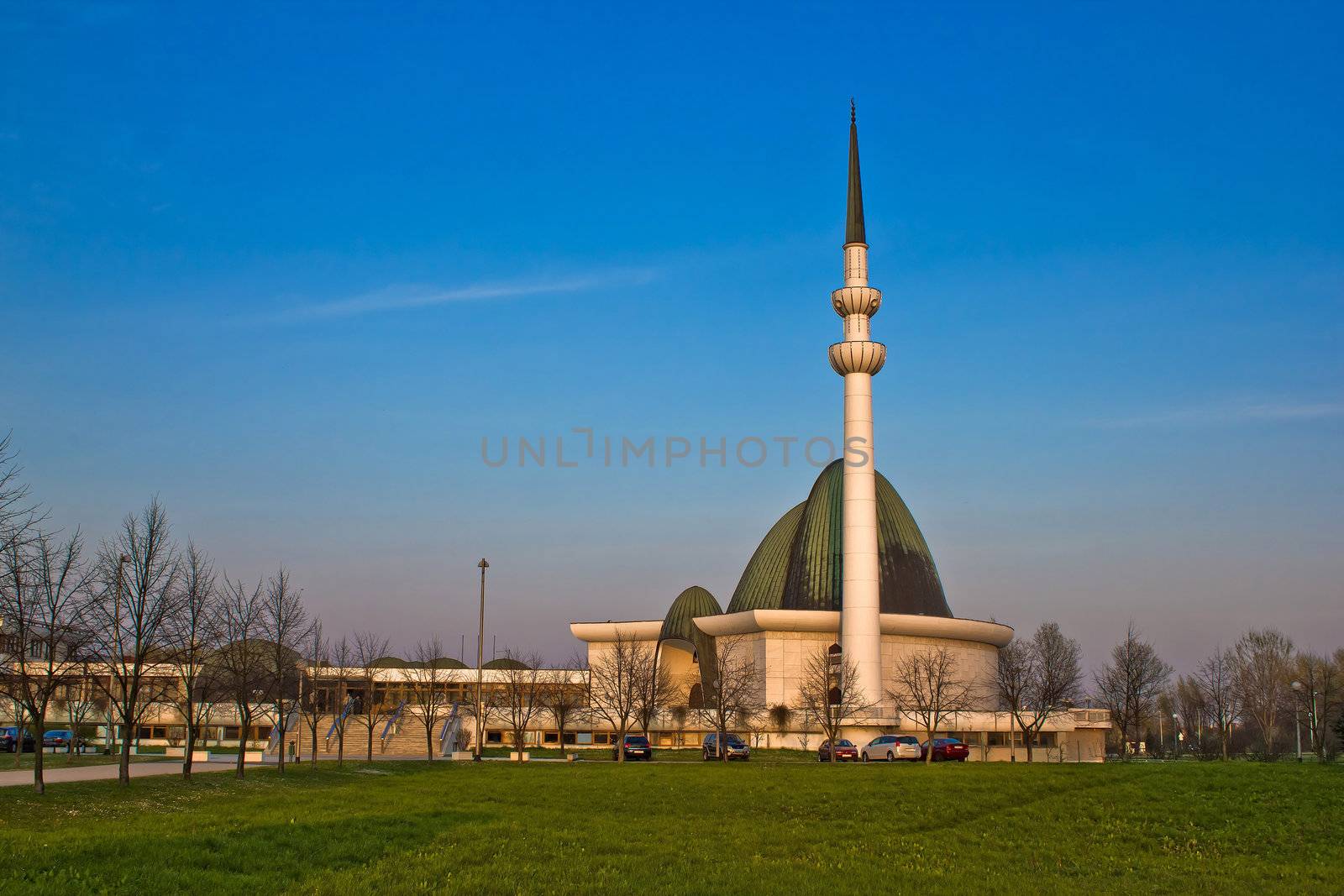 Capital of Croatia Zagreb mosque with blue sky and green grass