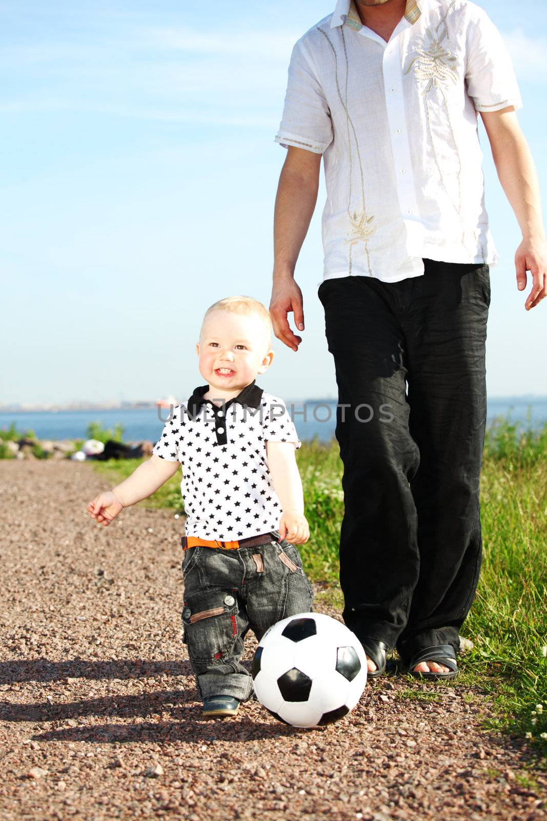 father and son play in soccer