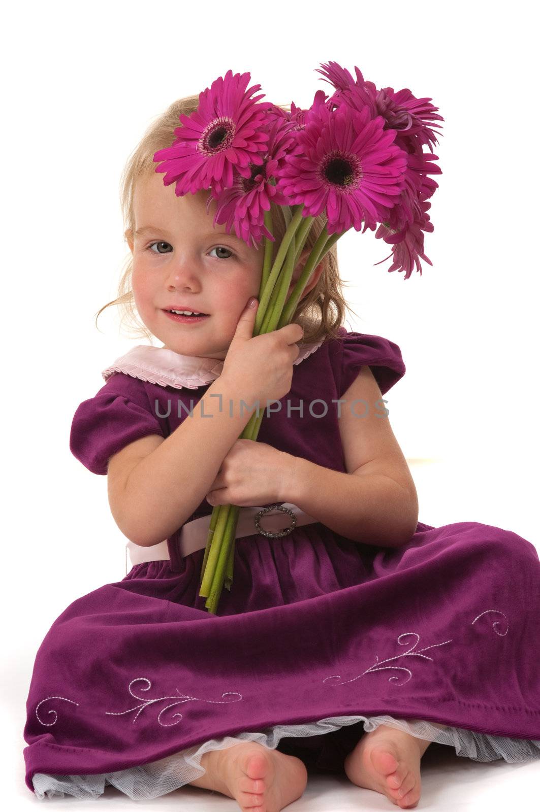 Girl giving flowers for mothers day or birthday