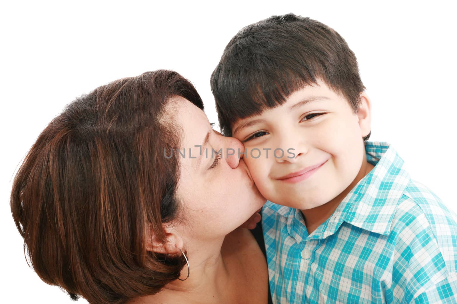 Adorable mother kissing her beautiful son isolated on white background