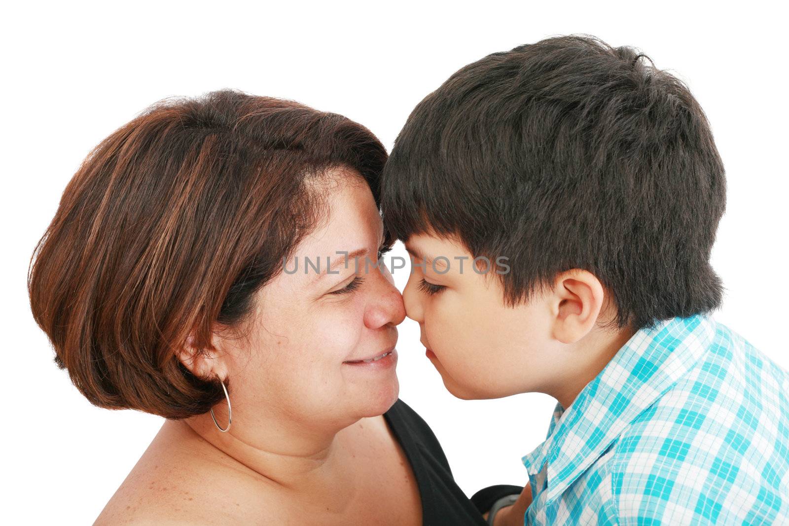 mother and son about to kiss - isolated over white