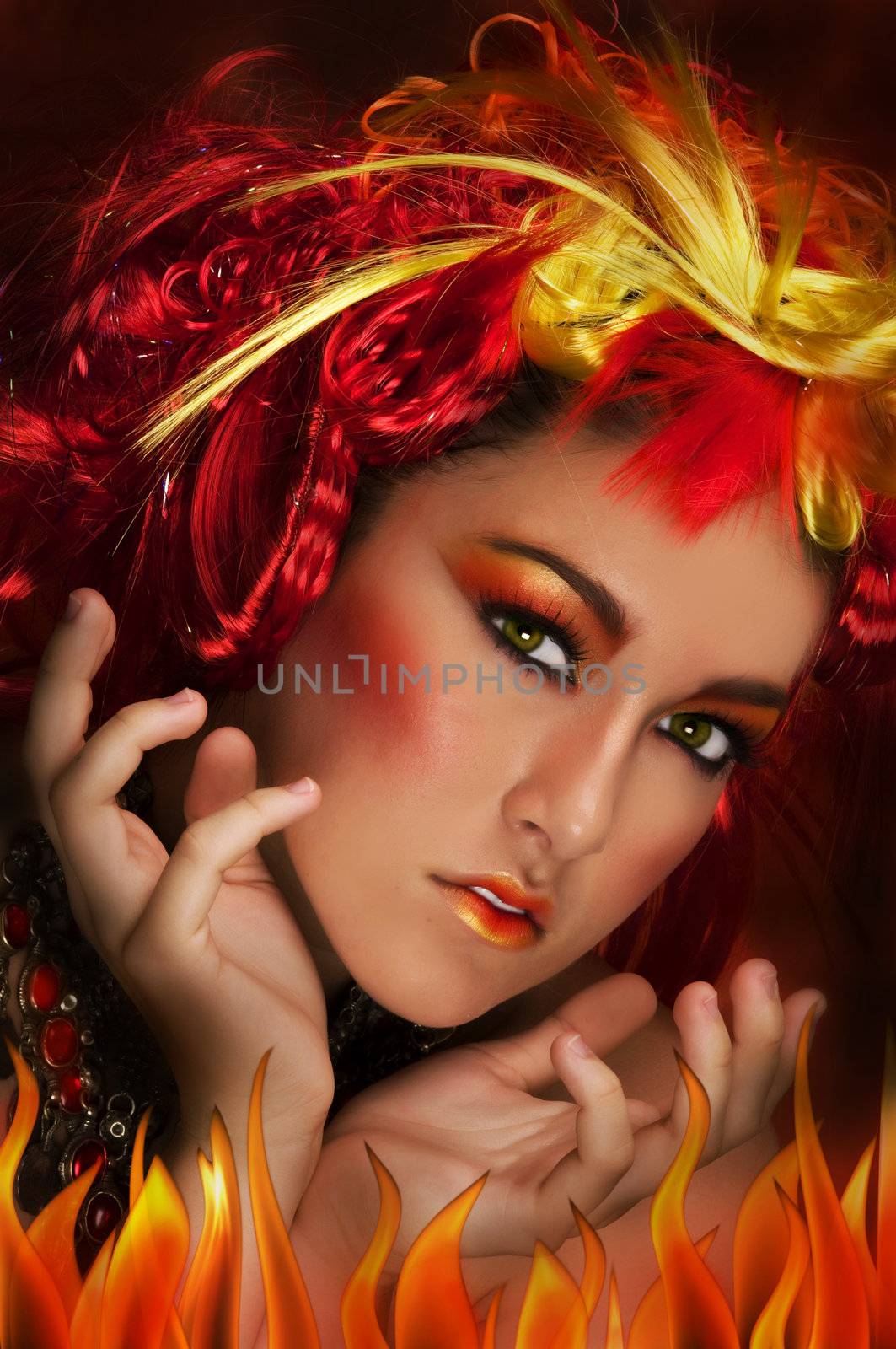 Girl with red, orange, yellow hair and beautiful make up 