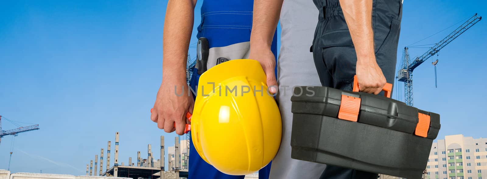 Different workers man closeup on building background