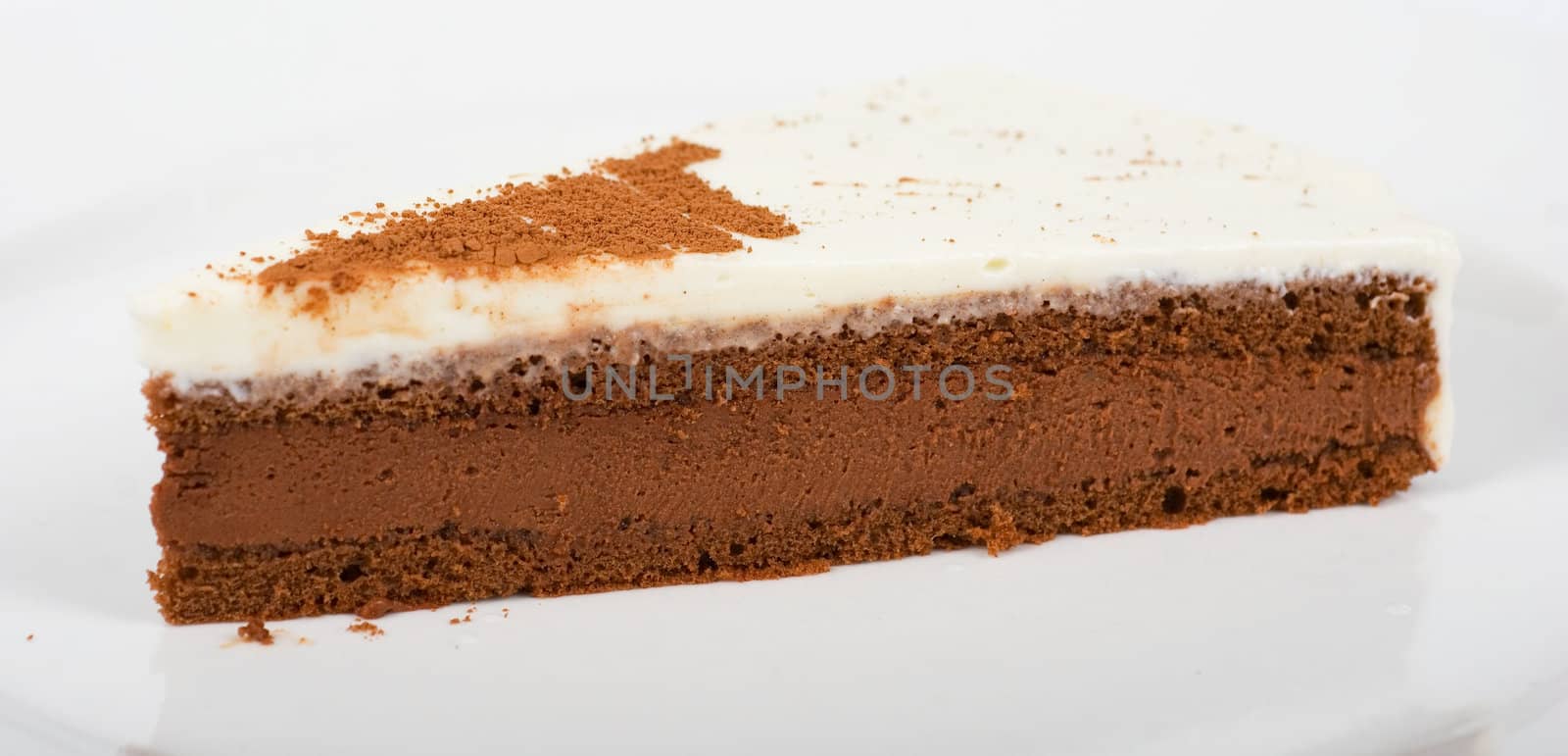 Tasty chocolate cake on a plate closeup