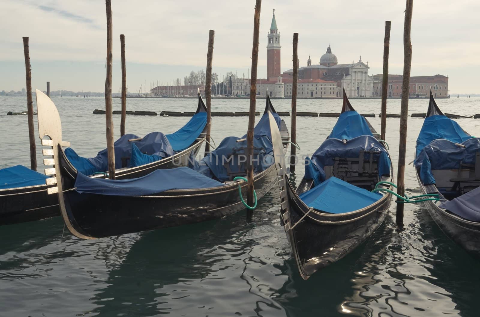 Gondolas in Venice, opposite the island of San Giorgio in winter