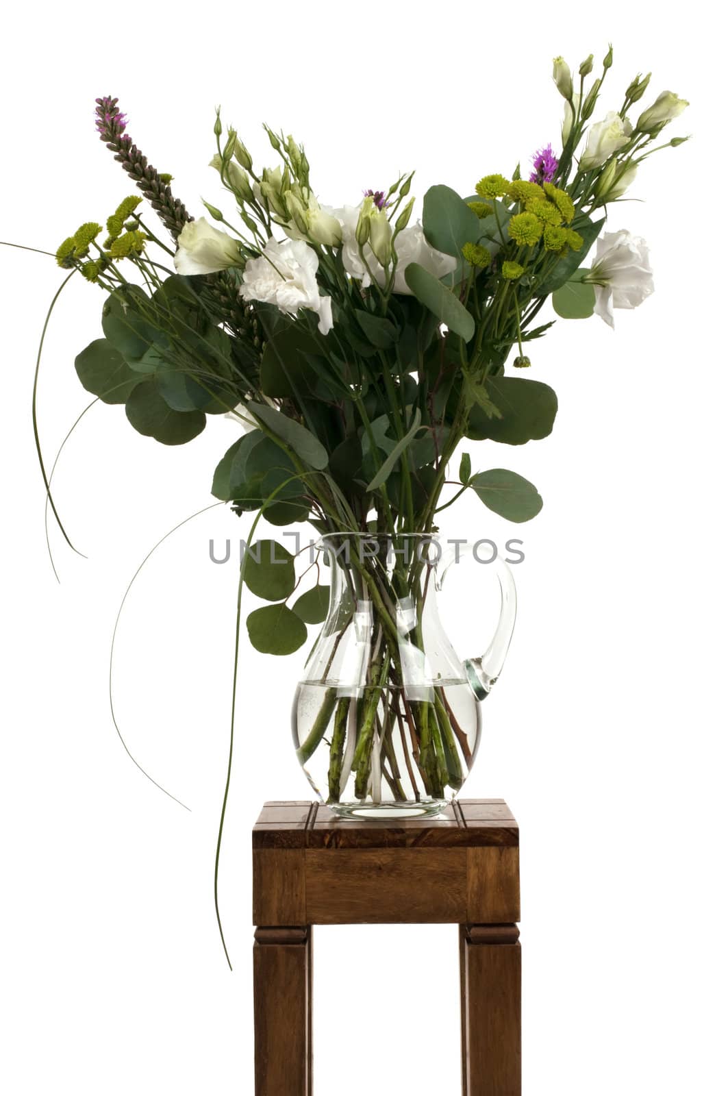 A bouquet of flowers on a small table