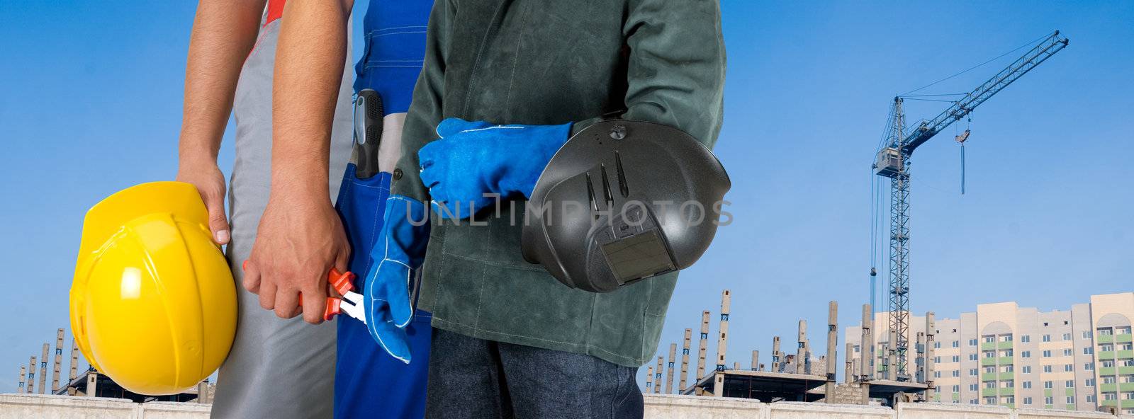 Different workers man closeup on building background