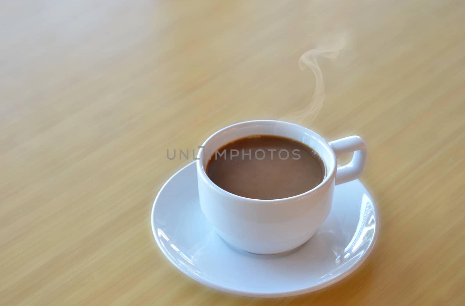  a white cup of hot coffee