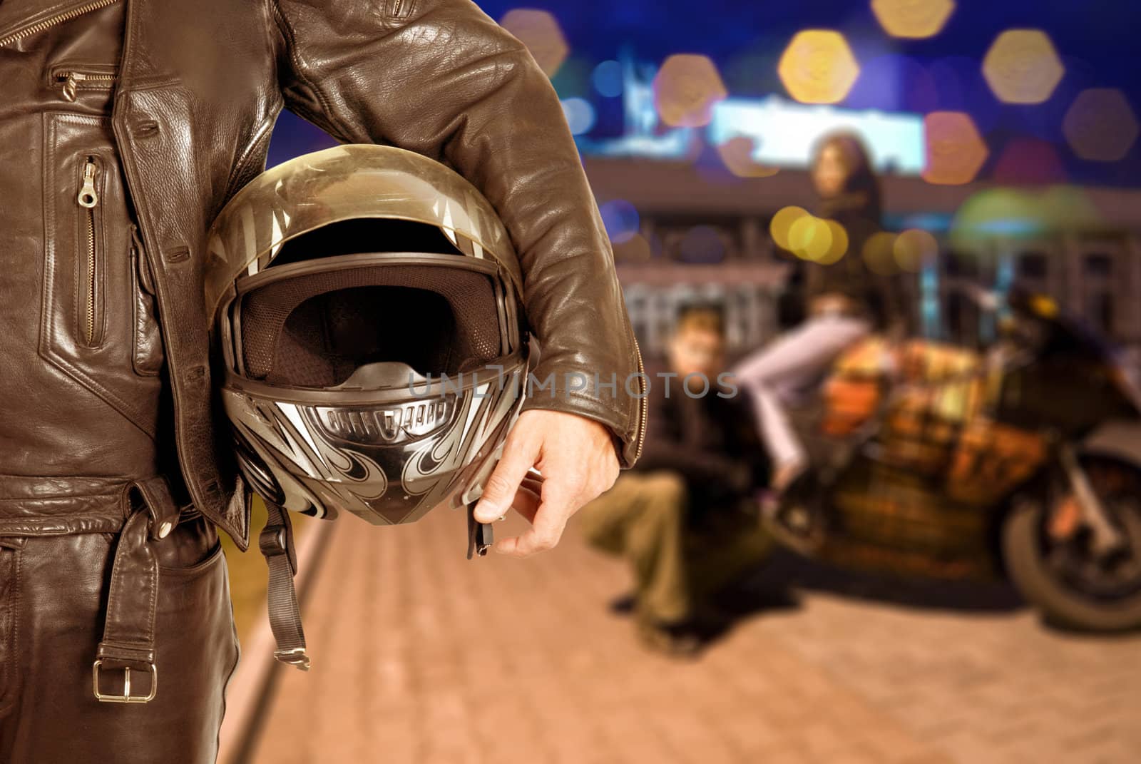 Biker closeup at night city background