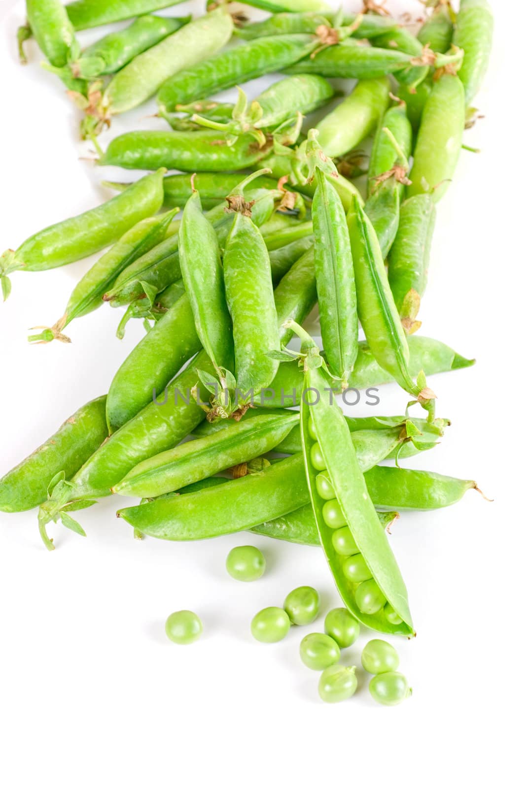 Ripe pea vegetable with green leaf isolated on white background