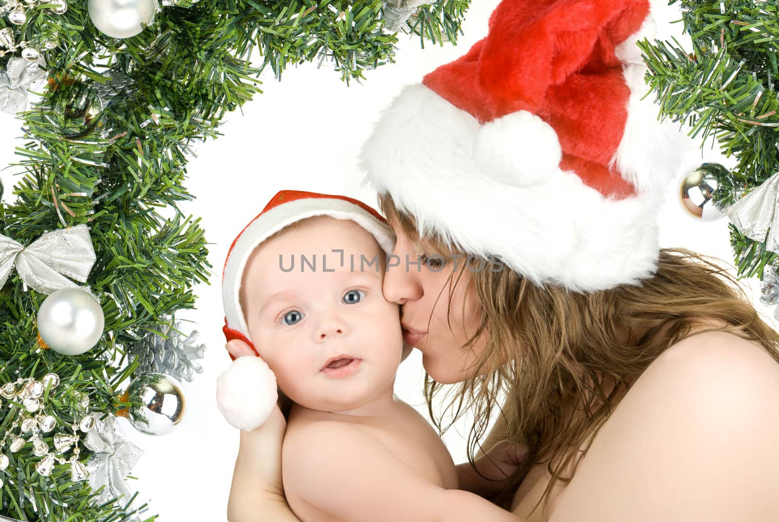 Beautiful mommy santa and her baby Santa boy on a white