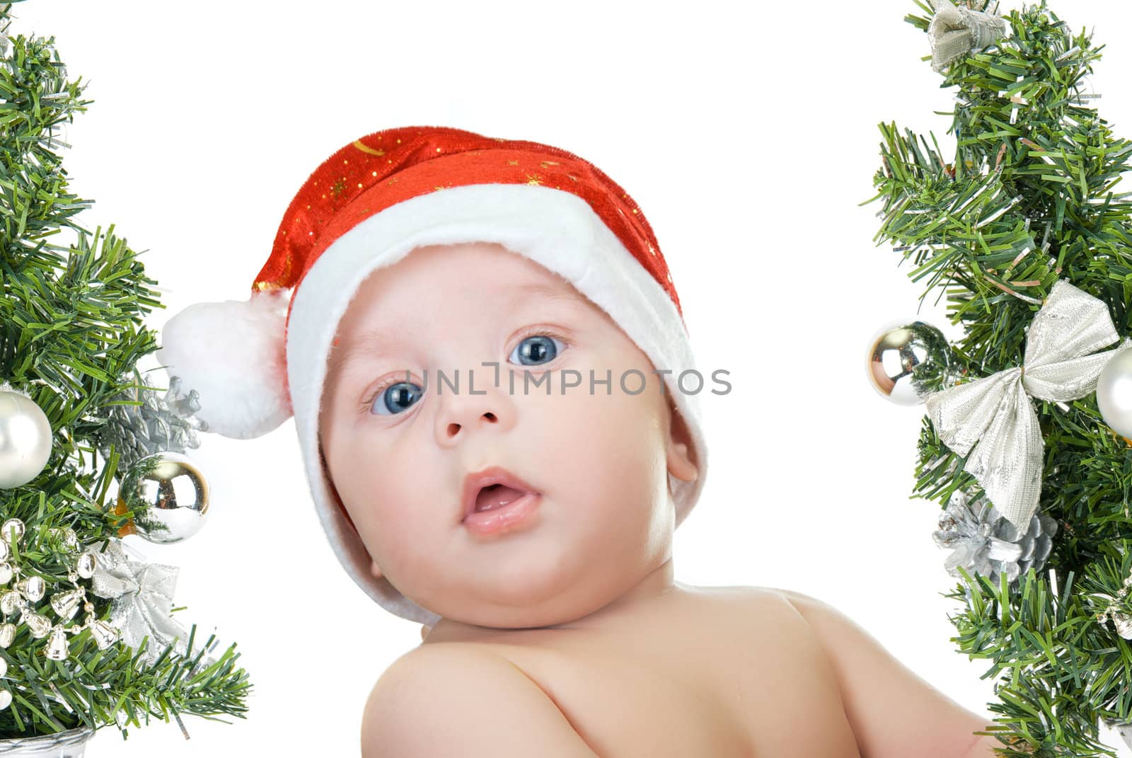 Beautiful santa baby boy isolated a white background