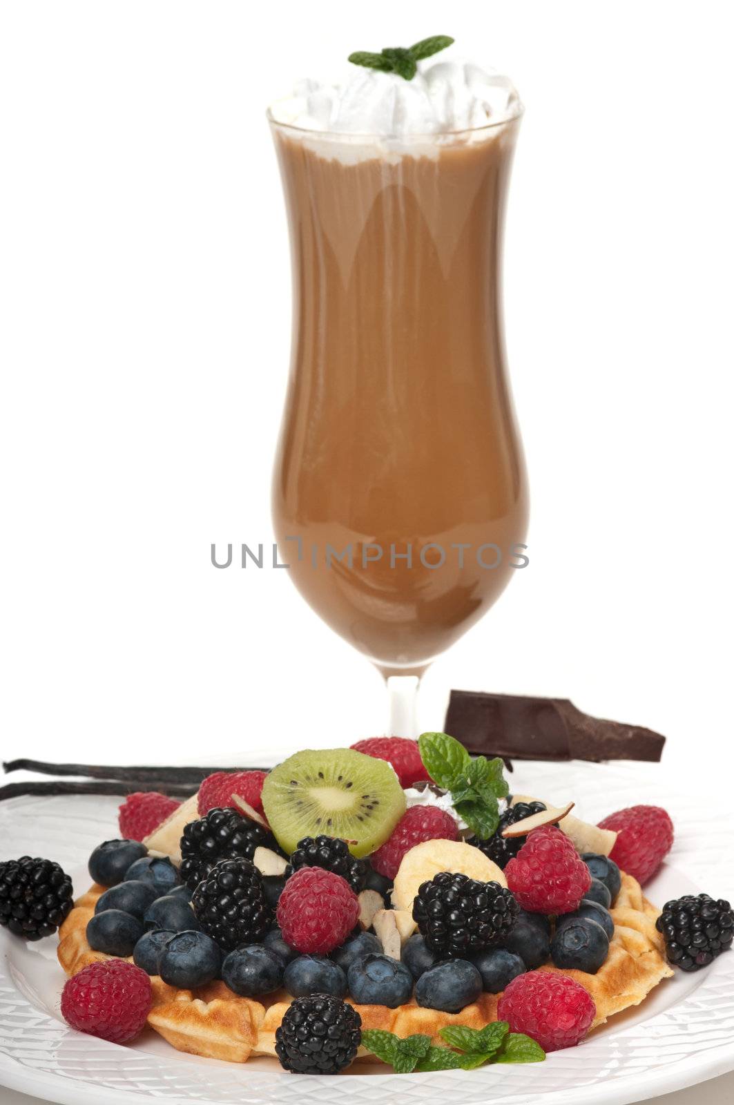 Coffee, chocolate and vanilla ice drink and waffle with fresh fruits