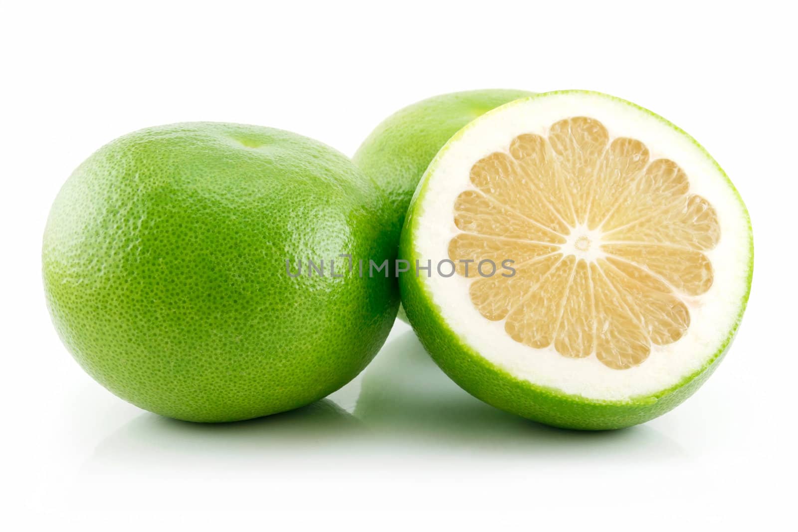 Ripe Sliced Grapefruit Isolated on White Background