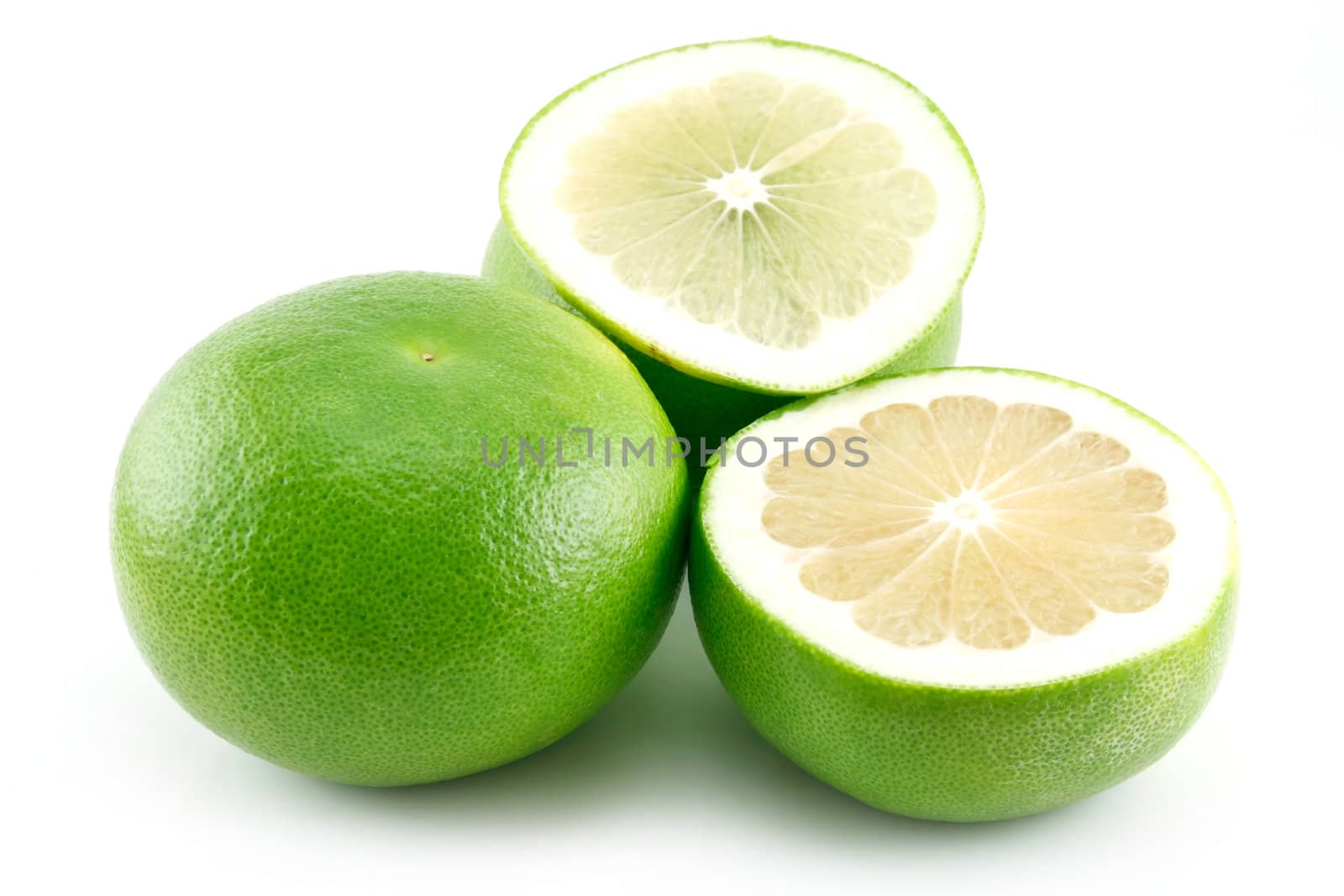 Ripe Sliced Grapefruit Isolated on White Background