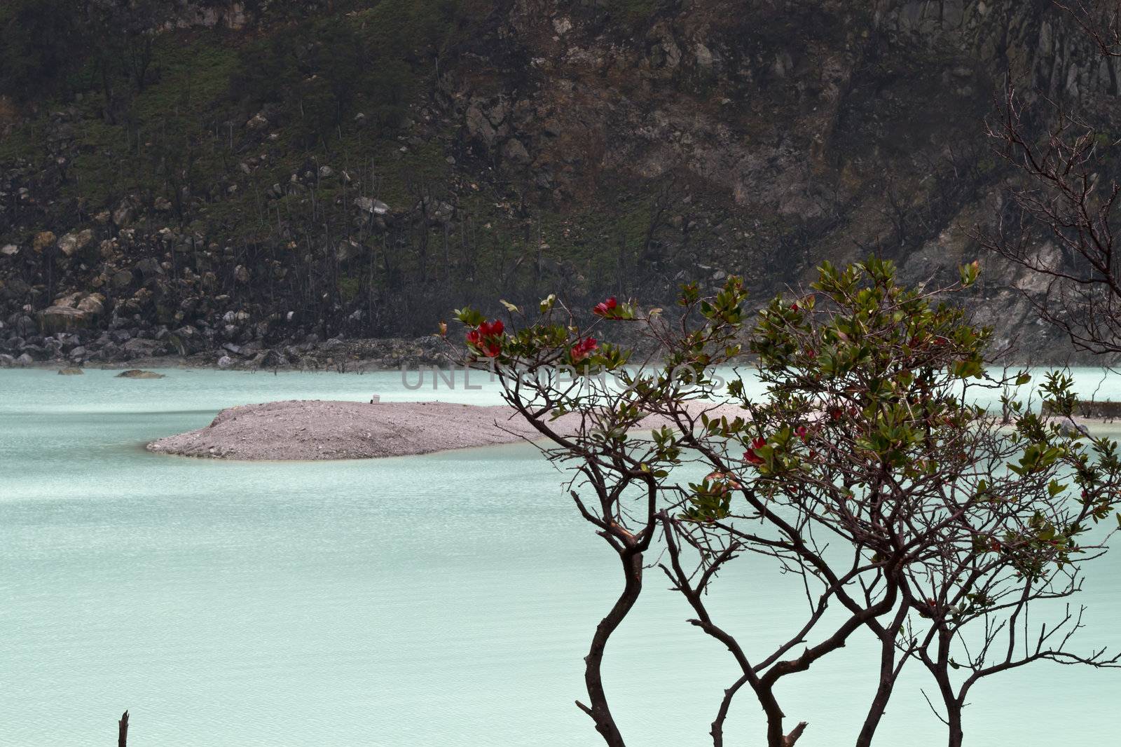 Blue water in volcanic crater lake in West Jawa