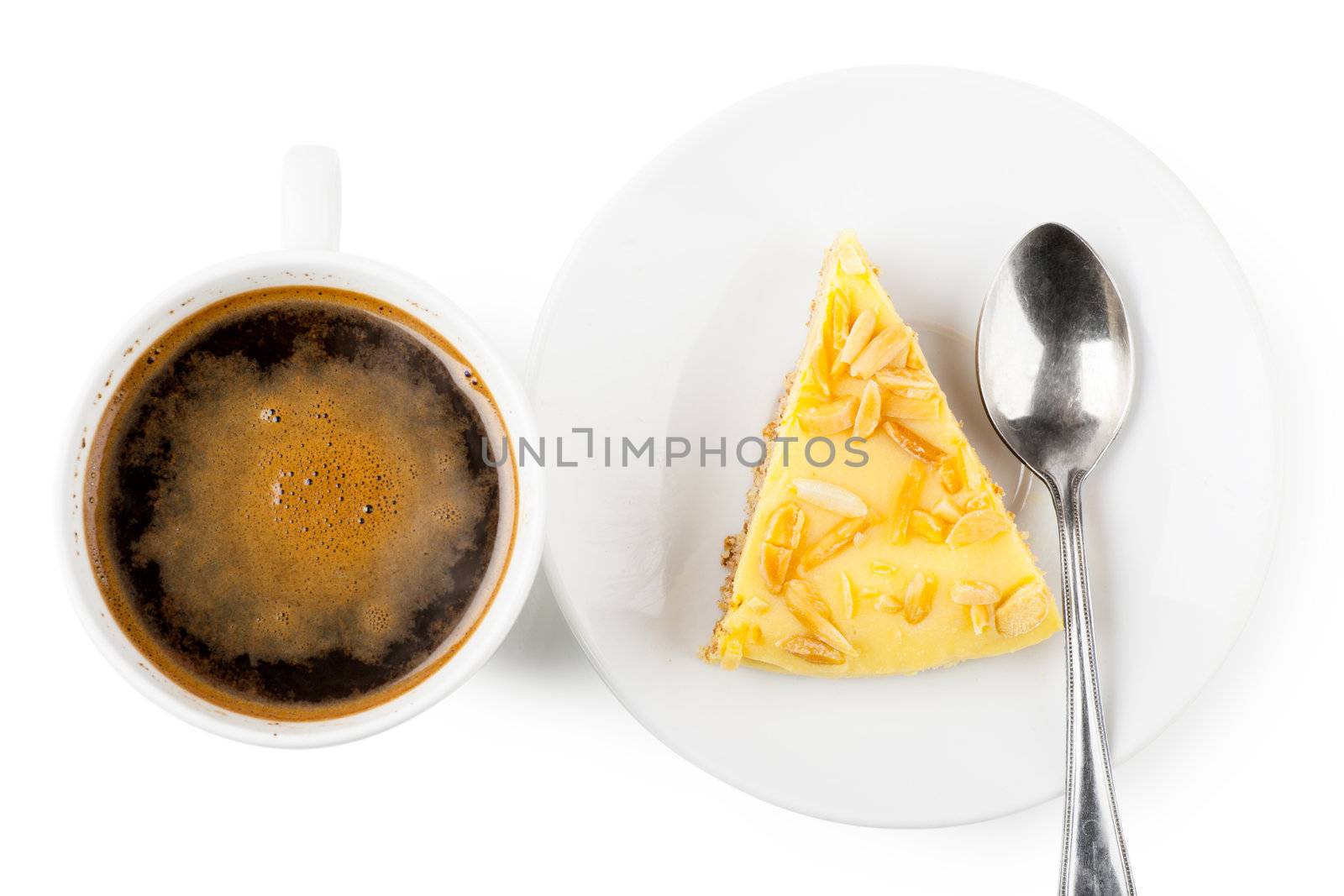 Top view of cup of coffee and piece of pie