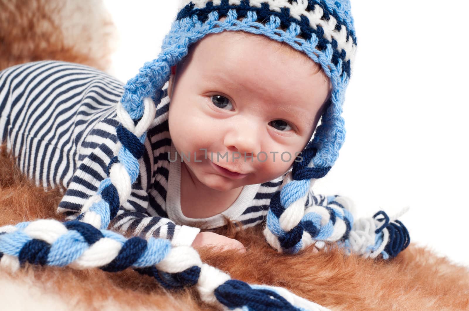 Shot of newborn baby lying on fur