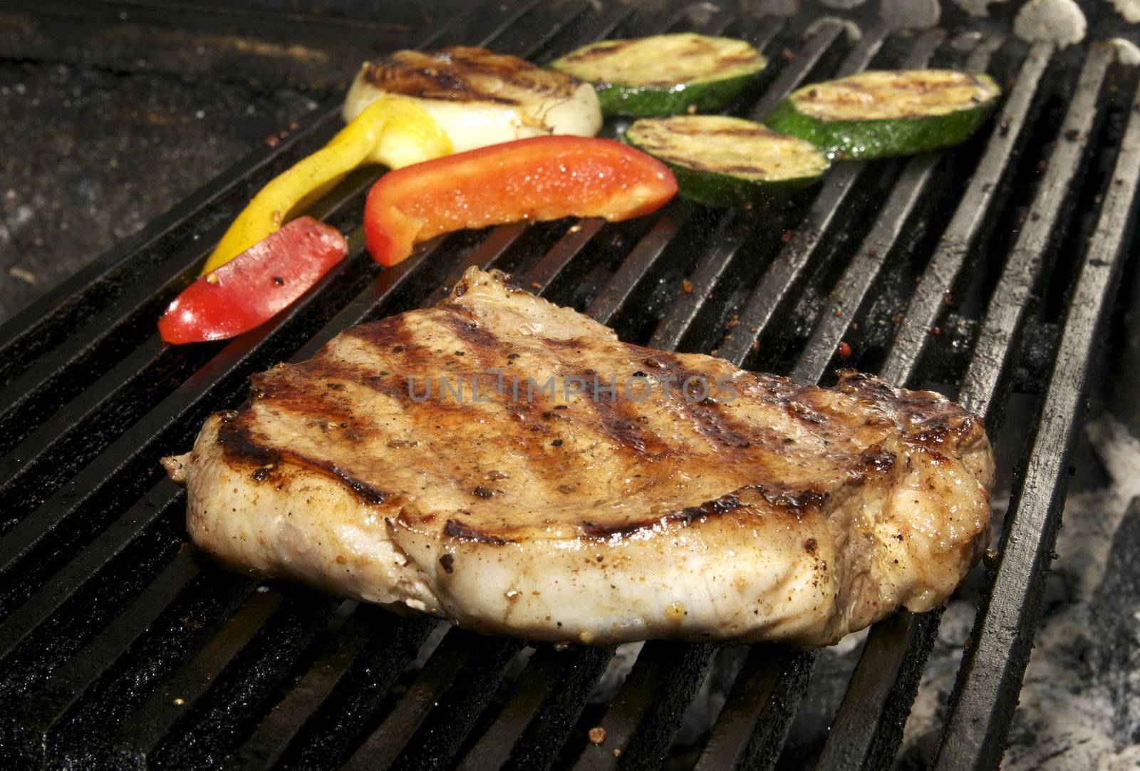 excellent cooking steak with grilled vegetables