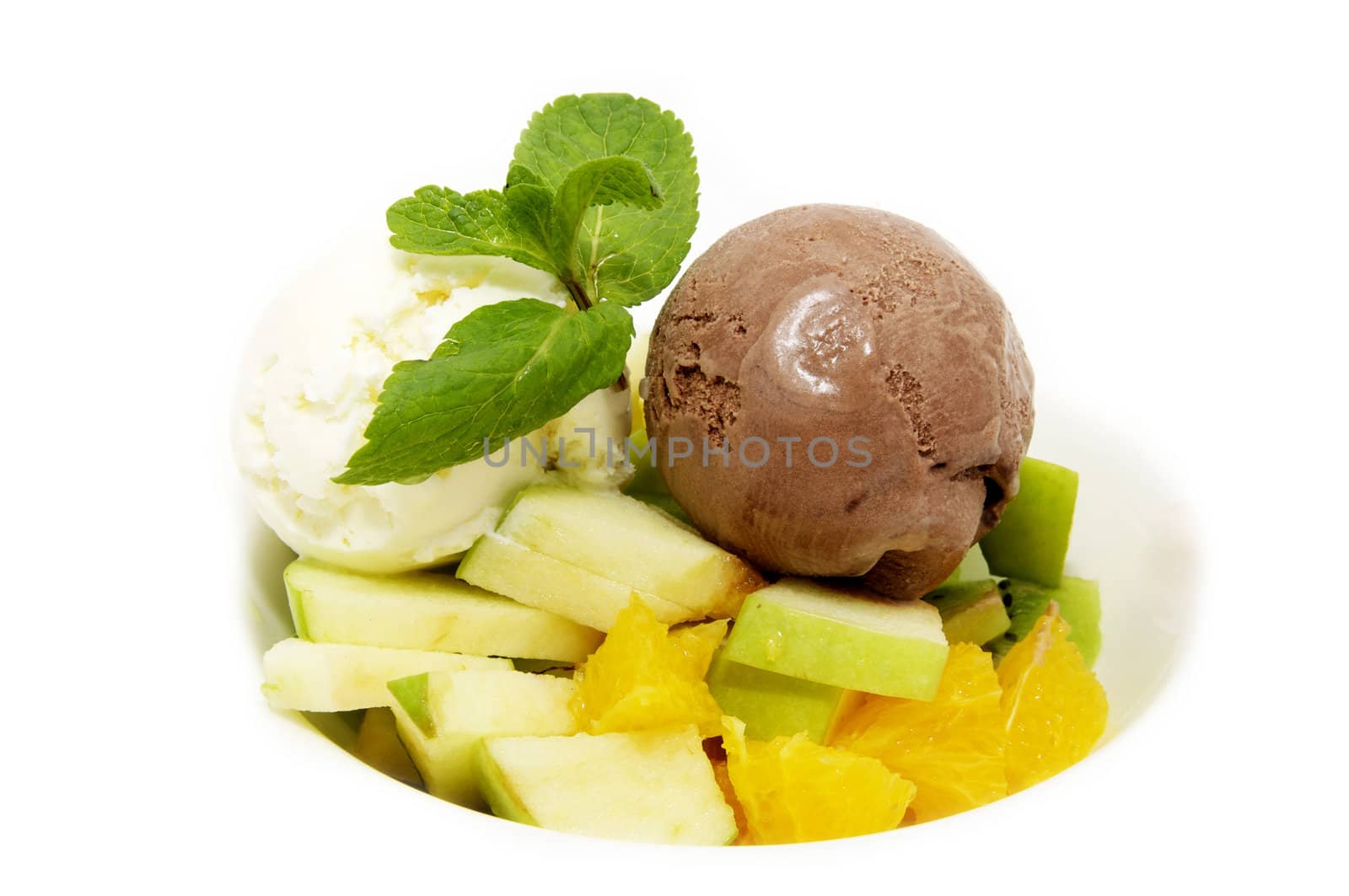 balls ice cream and fruit on white plate