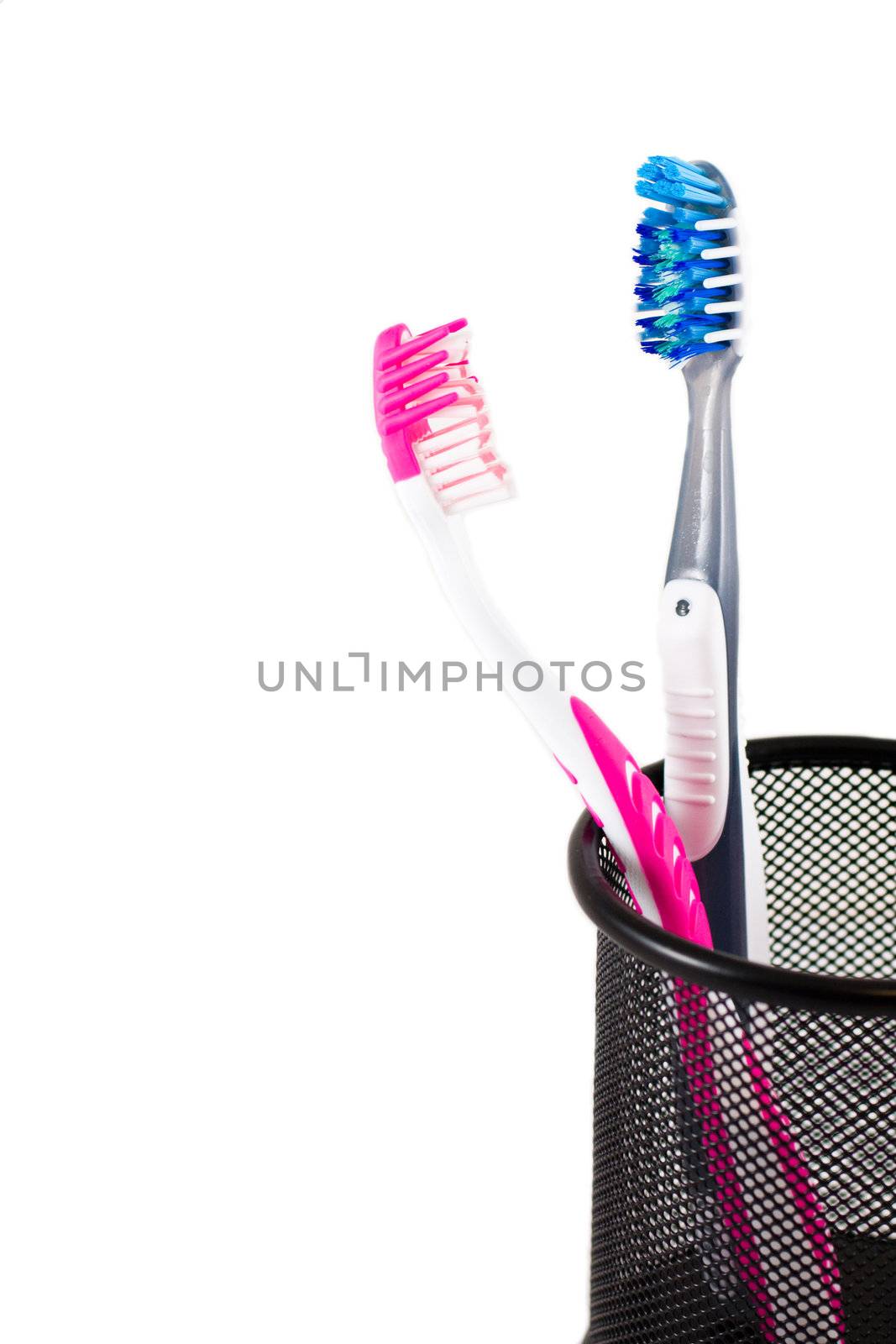 Two tooth-brush isolated on a white background