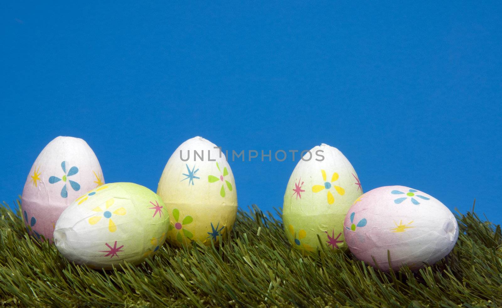 easter eggs on green grass