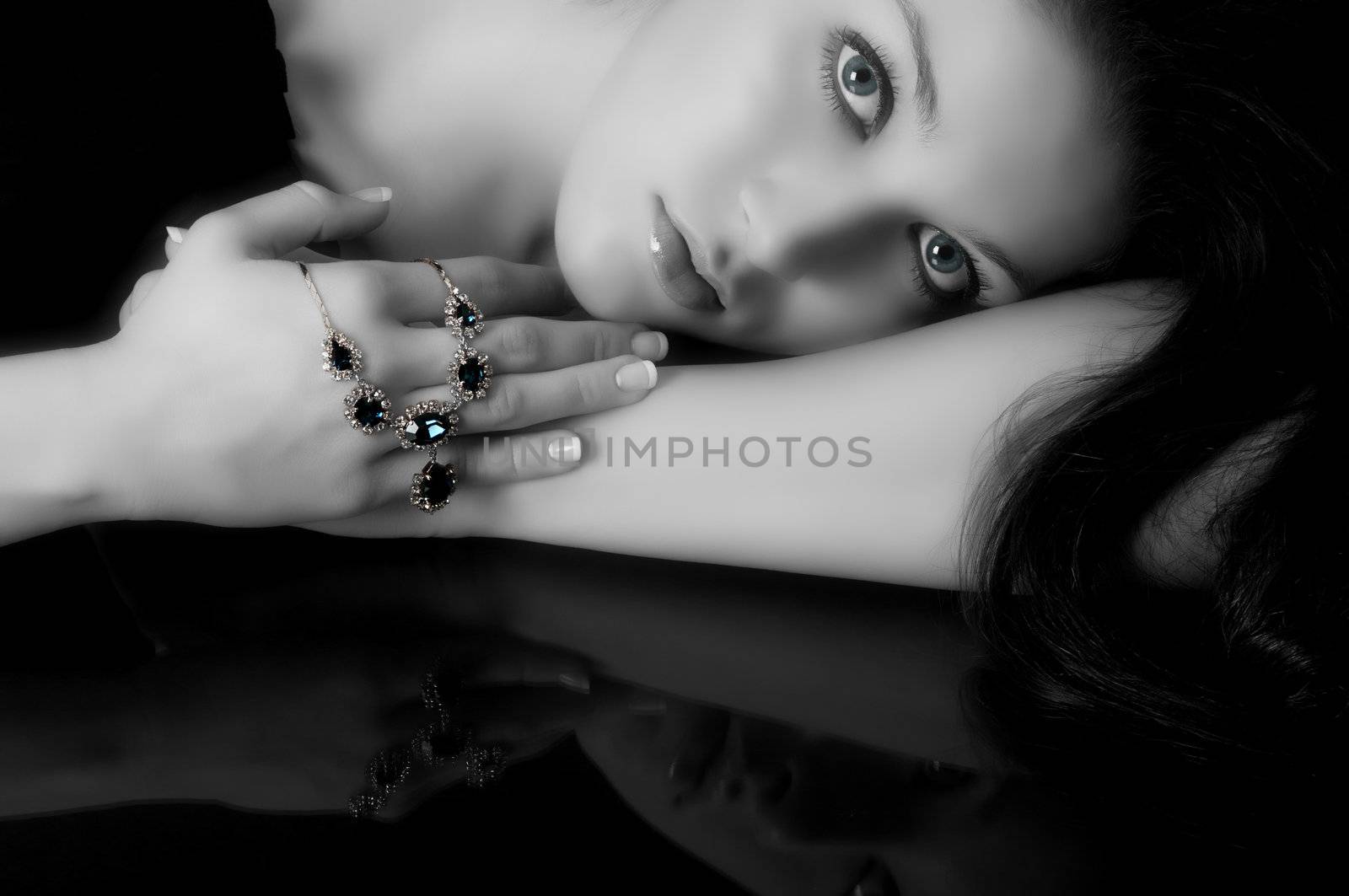 Model with diamond and sapphire necklace ( model's skin blurred and infrared to give silkiy and misty feeling)